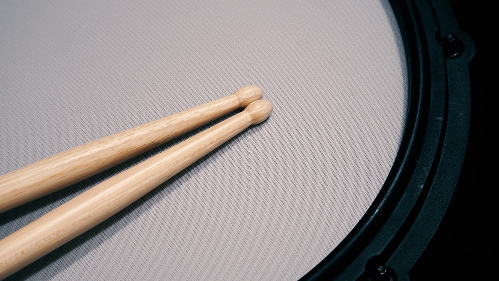 snare drum pad with sticks